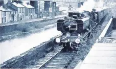  ??  ?? > Swansea Canal and railway line in 1965.