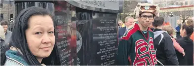  ??  ?? Terena Hunt and son Alan at the unveiling of a memorial at the legislatur­e Thursday for search-and-rescue volunteers who have died. Terena’s father and uncle died in a Provincial Emergency Program Air crash in 1970.