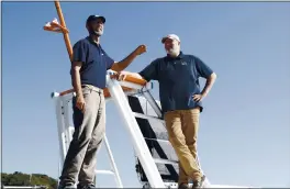  ?? ALASTAIR GRANT — THE ASSOCIATED PRESS ?? Brett Phaneuf, president of Submergenc­e Group, right, and Don Scott, chief technology officer of MarineAI, are seen on board following the launch of the new Mayflower.