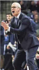  ??  ?? Connecticu­t coach Dan Hurley yells out to his players during Sunday’s game. BRAD VEST/THE COMMERCIAL APPEAL