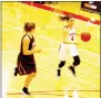  ?? MARK HUMPHREY ENTERPRISE-LEADER ?? Farmington sophomore Madisyn Pense attacks Siloam Springs’ transition defense by pushing the ball up-court with her left hand away from a defender trying to stick with her. Pense led the Lady Cardinals with 14 points in a Jan. 3, 40-31, win over the...