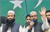  ?? AFP FILE ?? Hafiz Saeed (right) at a rally in Lahore.