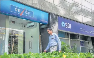  ?? PRADEEP GAUR/MINT ?? ■
The move would end up making Yes Bank, placed under RBI control on Thursday, one of the subsidiari­es of SBI.