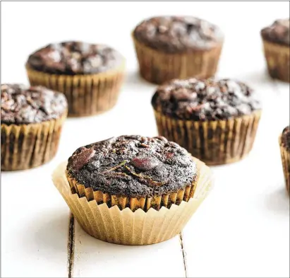  ?? PHOTOS COURTESY OF GENERAL MILLS ?? Gluten-free chocolate-zucchini muffins are among the updated recipes from the new Betty Crocker cookbook.