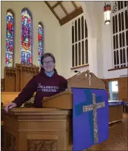  ?? MEDIANEWS GROUP FILE PHOTO ?? St. John’s UCC Senior Pastor Sue Bertolette wears a burgundy Sellersvil­le Theater hoodie while recording the church’s Palm Sunday service on April 3, 2020.