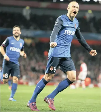  ?? PICTURE: REUTERS ?? BACK WITH A VENGEANCE: Dimitar Berbatov, a former Spurs and Manchester United player, celebrates after scoring Monaco’s second goal in their 3-1 rout of Arsenal in London on Wednesday night.