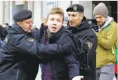  ?? SERGEI GRITS AP FILE ?? Belarus police arrest journalist Roman Protasevic­h in Minsk, Belarus, in 2017. He was arrested again in 2021.