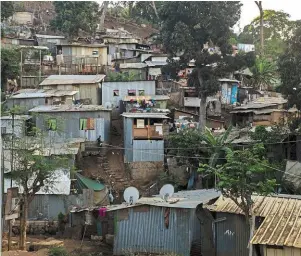  ?? | PHOTO : AXEL NODINOT, OUEST-FRANCE ?? Le bidonville de Kawéni, au nord de Mamoudzou.