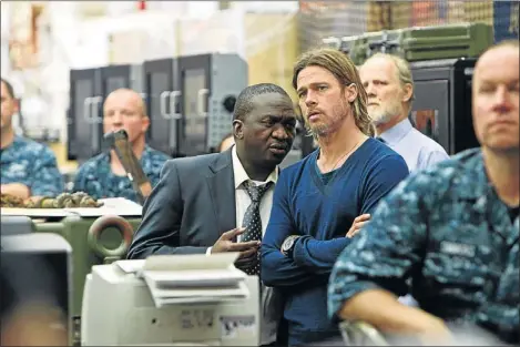  ?? PHOTO: JAAP BUITENDJK ?? INCREDIBLE: Fana Mokoena stars as Thierry Umutoni, the fictional deputy secretary-general of the United Nations, alongside Brad Pitt, who plays Gerry Lane in the sci-fie World War Z