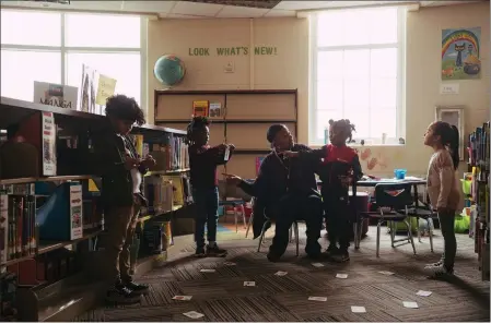  ?? BOB MILLER — THE NEW YORK TIMES ?? Kindergart­en students receive special attention in an early literacy interventi­on at Glen Iris Elementary in Birmingham, Ala., on Jan. 18. Students have made up significan­t ground since the pandemic school closings in 2020, but the gap between students from rich and poor communitie­s has widened, according to a national study.