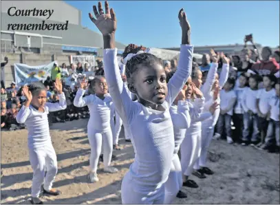  ?? PICTURE: ARMAND HOUGH ?? Micah Pienaar, 4, from Leonsdale Educare Centre in Elsies River, performs a dance with her friends beside flowers placed at the site where the body of Courtney Pieters was found. She was raped and murdered. MEC for Community Safety Dan Plato and...
