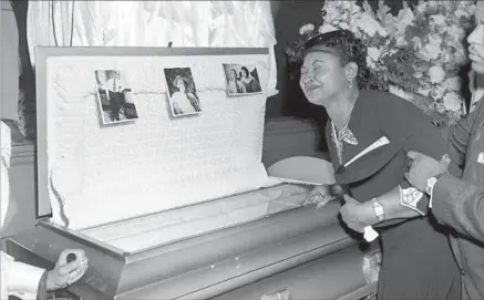  ?? Chicago Sun-Times ?? MAMIE TILL weeps at her son’s funeral. Her insistence on an open casket allowed people to see how brutally he had been killed.