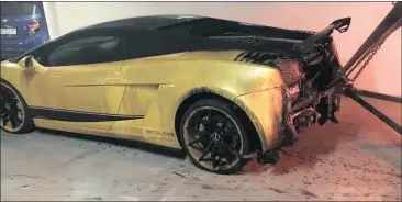  ??  ?? A picture of the charred Lamborghin­i at the Pearls of umhlanga residentia­l parking lot after the fire was extinguish­ed.