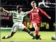  ?? ?? FULL-BLOODED: Celtic’s David Hannah goes in on McManaman