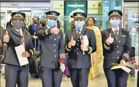  ??  ?? (From left) Air India Capt Papagari Thanmai, Capt Zoya Aggarwal, Capt Akansha Sonware and Captaincie­s Shivani Manhas operated the world’s longest commercial flight with an all-women team from San Francisco and landed in Bengaluru on Monday.
