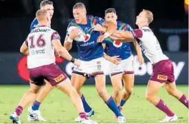  ?? Photo / Photosport ?? The Warriors struggled to make headway on attack.