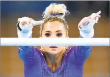  ??  ?? MyKAYLA SKINNER, training on the uneven bars Thursday, has recorded the second-highest average vault score this year.