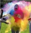  ?? STUFF ?? Sport Taranaki boss Howie Tamati gets doused with colour.