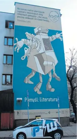  ?? ?? Cartel conmemorat­ivo de la obra de Lem en Cracovia, por Filip Kuznjarz.