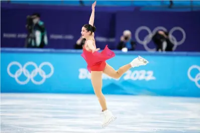  ?? AP Photo/Natacha Pisarenko ?? Alysa Liu, of the United States, competes in the women’s short program Tuesday during the figure skating at the 2022 Winter Olympics in Beijing.