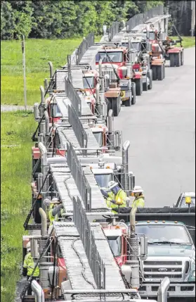  ?? JOHN SPINK / JSPINK@AJC.COM ?? Crews staged bridge beams near the old toll plaza on Ga. 400 as Piedmont Road closed Tuesday morning for 24 hours for I-85 bridge repairs.