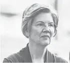  ?? SCOTT EISEN/GETTY IMAGES ?? The Washington Post says a State Bar of Texas registrati­on card it obtained through an open records request is the first record from Sen. Elizabeth Warren’s past where she claimed Native American heritage in her own handwritin­g.