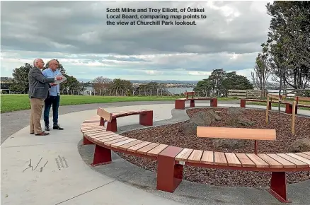  ?? ?? Scott Milne and Troy Elliott, of rākei Local Board, comparing map points to the view at Churchill Park lookout.