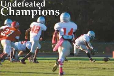  ??  ?? Cedartown’s defense scooped up a fumble for a touchdown following a tackle during the fourth quarter against Chattooga. Below: The Bulldogs’ middle school team focused their attack on the ground in their final win of the season to go undefeated.