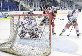  ?? KEVIN ADSHADE/THE NEWS ?? Pictou County Crushers’ co-captain Evan MacLennan scores a goal against the Summerside Western Capitals on Tuesday.