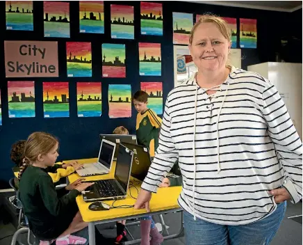  ?? PHOTO: DOMINICO ZAPATA/STUFF ?? Cambridge Primary School teacher Carol-Lynn Hill is on the hunt for old laptops to help pupils with learning difficulti­es.