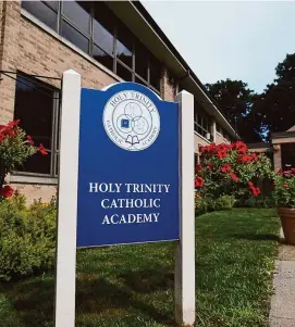  ?? Brian A. Pounds/Hearst Connecticu­t Media ?? Holy Trinity Catholic Academy officials said it’s not following the new state cutoff and allowing those born after Sept. 1. into next kindergart­en year.