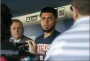  ?? KYUSUNG GONG — THE ASSOCIATED PRESS ?? Houston Astros relief pitcher Roberto Osuna is interviewe­d in the dugout before a baseball game against the Los Angeles Dodgers in Los Angeles Sunday. Osuna served a 75-game suspension for violating Major League Baseball’s domestic violence policy.