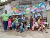  ?? CONTRIBUTE­D PHOTO BY MICHELLE SERODINO HUNTER ?? Catherine Colby, back right, poses with a group in the Dominican Republic during a recent trip.