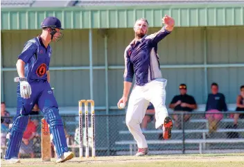  ?? ?? Toby Bayne bowls for Neerim District as they look to defend their score.