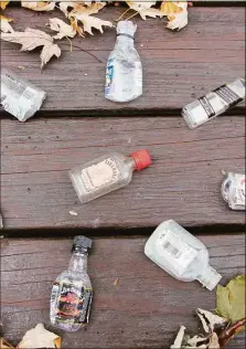  ?? Judy Benson / Connecticu­t Sea Grant / Contribute­d photo ?? Empty nips bottles collected on a recent walk in a residentia­l neighborho­od in New London. A first-in-the-nation stewardshi­p program places a 5-cent environmen­tal fee on the sale of each nip container sold in Connecticu­t.