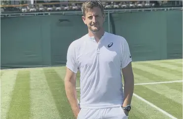  ??  ?? COACH: Adam at the Wimbledon Tennis Championsh­ips in 2019