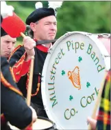  ??  ?? Millstreet Pipe Band drum major Donie Moynihan at the Rathcoole commemorat­ion of family relative Bernard Moynihan.