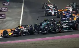  ?? Photograph: Hollandse Hoogte/Shuttersto­ck ?? Lewis Hamilton and George Russell collided on the first lap of the Qatar Grand Prix.