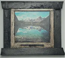  ??  ?? Alberta-raised artist Brad Holt does acrylic paintings based on photograph­s he’s taken and then adds handmade frames from reclaimed wood.