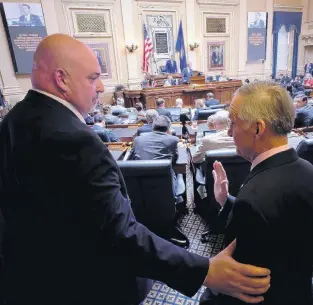  ?? ASSOCIATED PRESS FILE ?? House Majority Leader C. Todd Gilbert, R-Shenandoah, left, and Senate Majority Leader Thomas K. Norment Jr., R-James City, right, confer at the floor session of the Virginia House of Delegates, in August 2018.