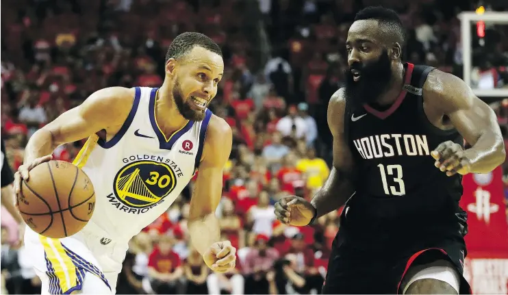  ?? — GETTY IMAGES ?? Stephen Curry, left, of the Golden State Warriors drives against James Harden of the Houston Rockets on Monday in Houston, Texas. The Warriors won 101-92.