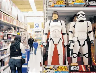  ?? Christina House For The Times ?? U.S. SALES of “Star Wars”-related toys slowed in late 2017, an analyst wrote, despite “The Last Jedi” being the top-grossing film released in the U.S. last year, raking in $596 million.