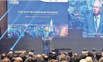  ??  ?? Najib delivers his keynote address at InvestKL Annual Ministeria­l Event 2018 yesterday. — Bernama photo