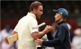  ?? ?? Stuart Broad (left) shakes hands with England captain Joe Root after the fourth Ashes Test at Sydney Cricket Ground. Photograph: Cameron Spencer/Getty Images