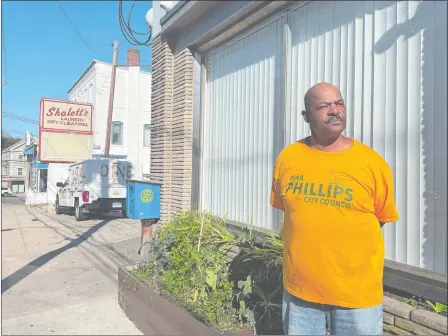  ?? PHOTOS BY JOHN PENNEY/THE DAY ?? Brian Chapman, a 61-year-old New London man who has experience­d homelessne­ss during his life, stands outside the New London Community Meal Center on Montauk Avenue on Friday.