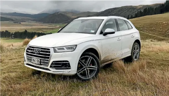  ??  ?? Yes, you can go off-road in a Q5. S-version has more sophistica­ted AWD system than four-cylinder models though.