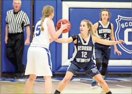  ??  ?? Mia Clark (12) and the Georgia Northweste­rn Lady Bobcats held visiting Toccoa Falls College to just two points in the second half on Saturday in a 63-27 victory. (File photo/Scott Herpst)