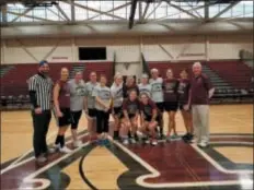  ?? SUBMITTED PHOTO ?? Taking part in the Garnet Valley girls basketball reunion and basketball game were, from left, front row, Gina Ricci, Shannon Woods, and back row, referee Ryan Woods, Dr. Rachel Daltry, Amy Tarr, Katie Tarr, Karen (Slowik) Linton, Alaina Bradley, Allyson Heavens, Coley Ricci, Emily Mallon, Beth (Rapczynski) Archer, Suzanne Teaf, and GV head coach Joe Woods.