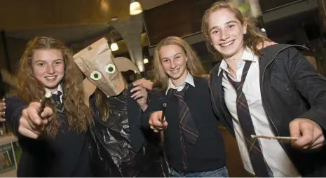  ?? PHOTOS: KEVIN FARMER ?? EXPELLIARM­US!: Dressed in their magical best are (from left) Georgie Scouller, Evie Mason, Phoebe Meyer Elks and Laura Craft.