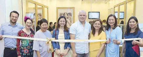  ??  ?? Miladay chairman Mark Dayrit with (from left) president Michelle Dayrit-Soliven, Ayala Malls vice president Rowena Tomeldan, Shawntel Nieto, Dr. Jet Nieto, Dr. Girlie Nieto, Miladay chief operating o cer Yvonne Dayrit-Romualdez, and director for public...